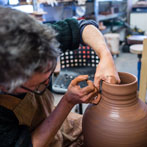 Doug Fitch and Hannah McAndrew making a jug for me